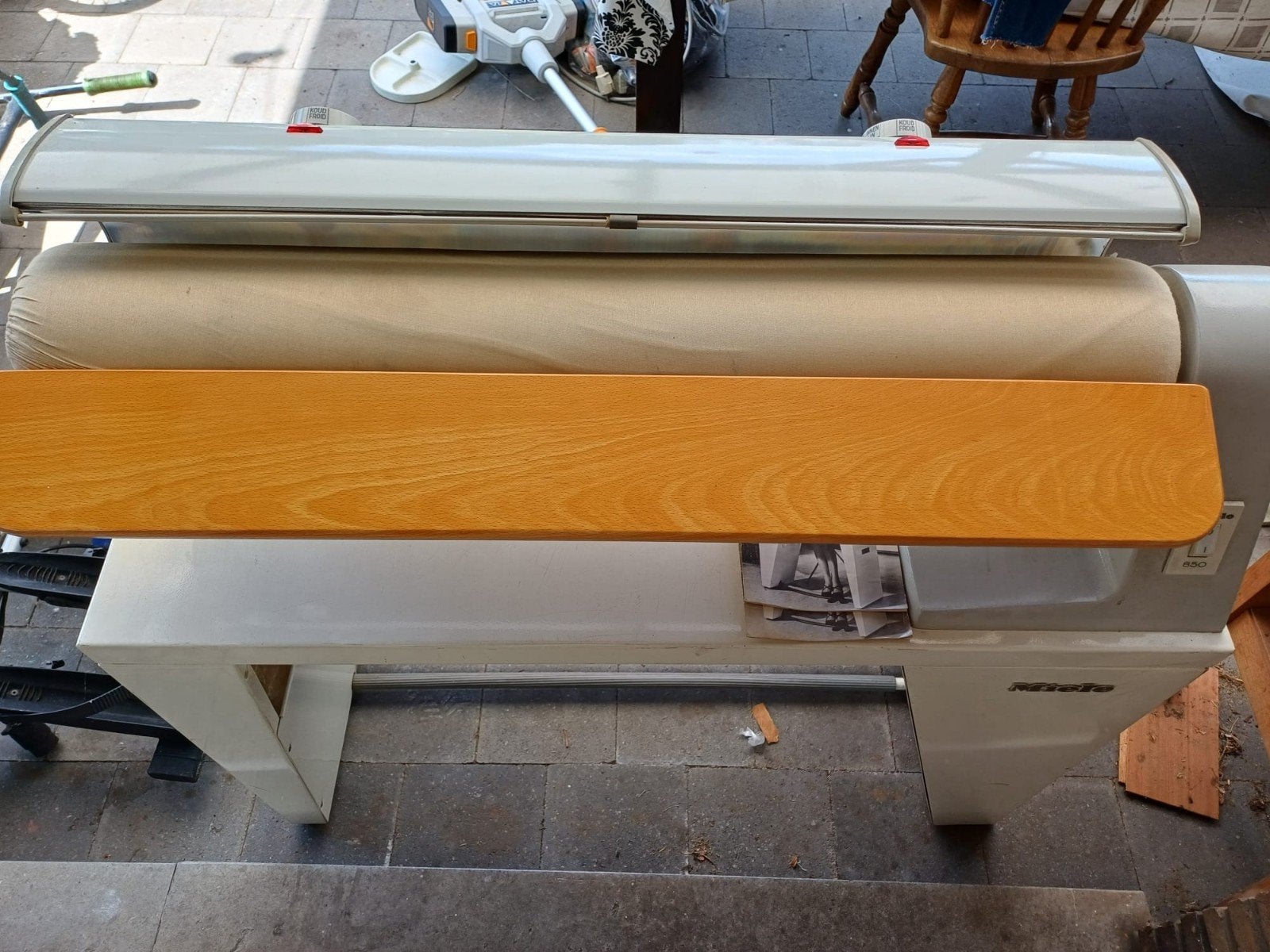 Miele strijkrol 850, Ophalen