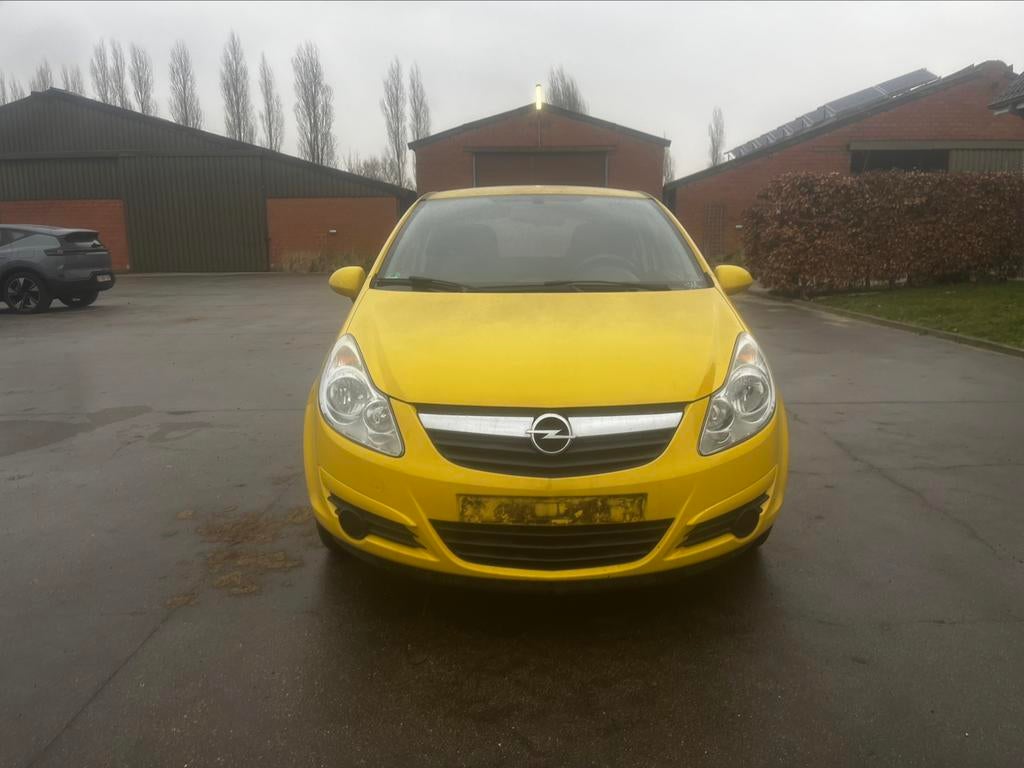 OPEL CORSA 1.0BENZINE VAN 2010 MET 65000DKM 12 GARANTIE, Auto's, Voorwielaandrijving, Stof, Zwart, Overige kleuren