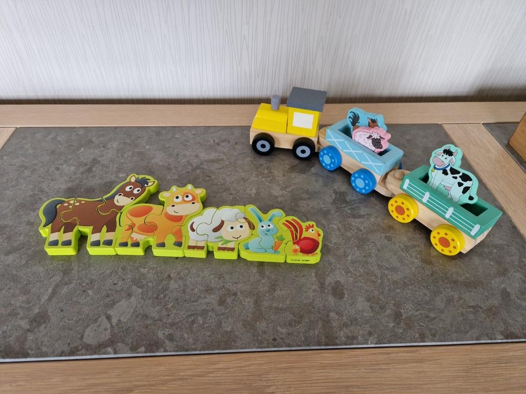 Houten dierenpuzzel en trein, Enlèvement