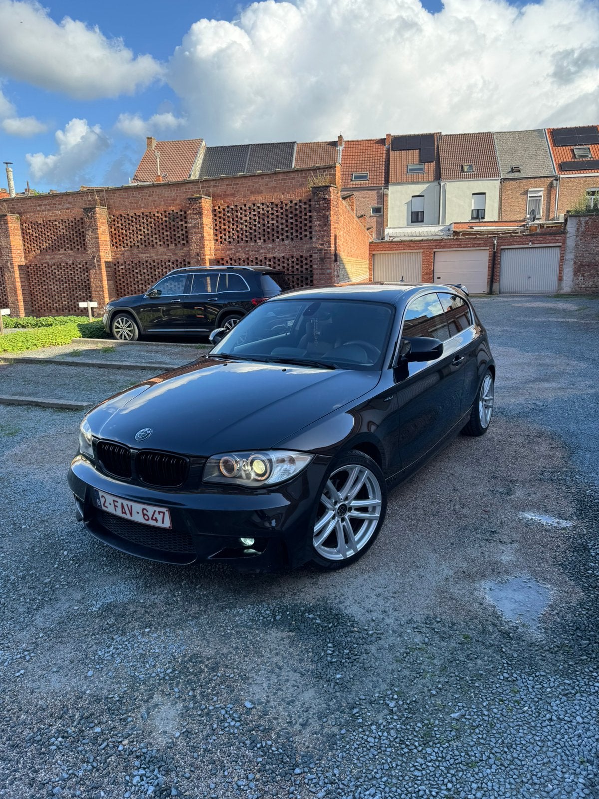 BMW 1-SERIE 2.0 BENZINE M-PAKKET – FULL OPTION, Auto's, Adaptive Cruise Control, Zwart, Leder, Bruin