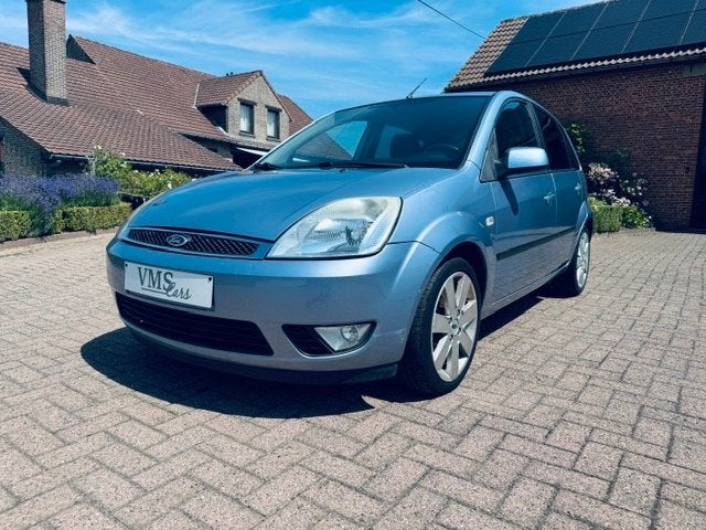 Ford Fiesta 1.3 Benzine * Garantie * Airco *, Auto's, 1299 cc, Stof, Zwart, Blauw