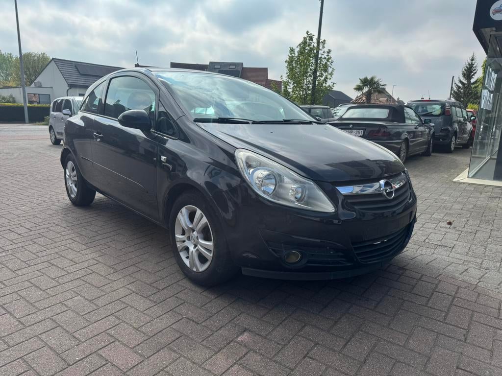 Opel Corsa 1.2 - BENZINE - AIRCO - 143.000 km - 2007, Auto's, Stof, 1229 cc, Zwart, Bedrijf