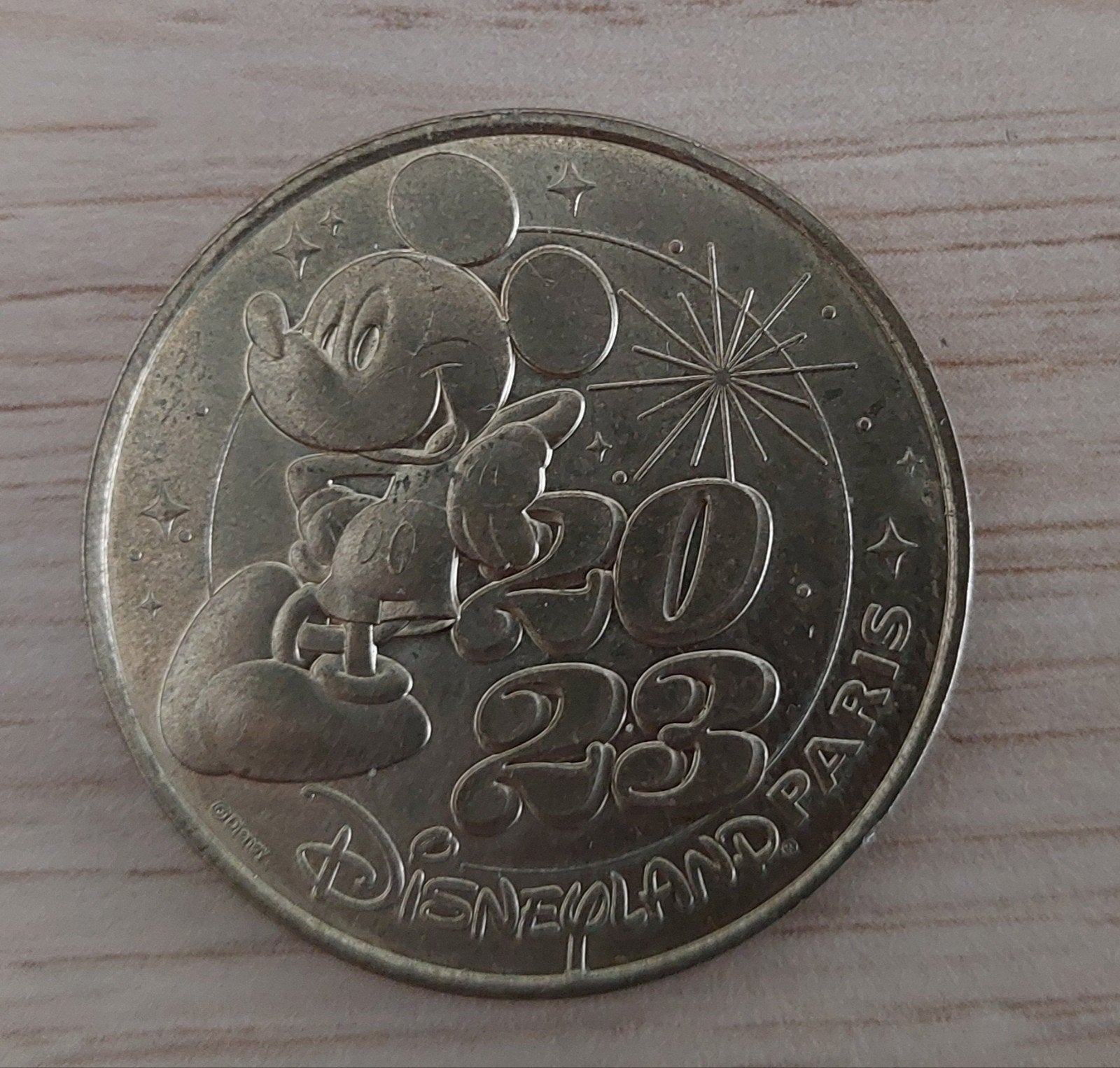 Disney munt 2023, Ophalen