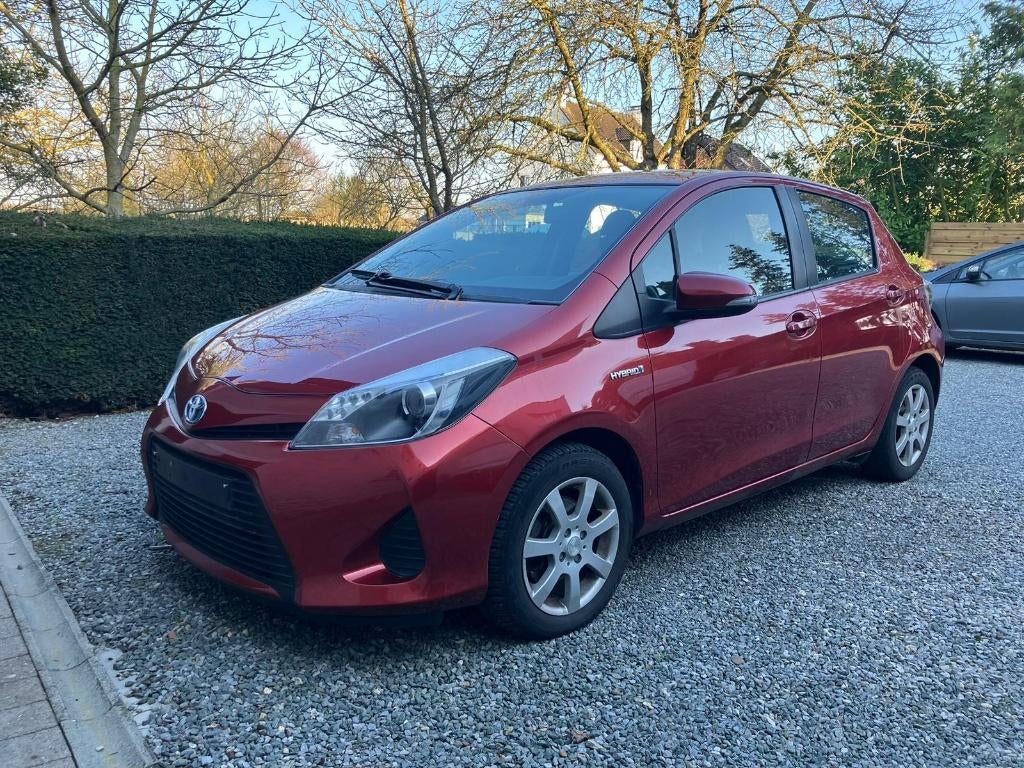 Toyota Yaris 1.5 Hybride - Airco - Parkeercamera - Garantie, Auto's, Euro 5, Stof, 1498 cc, Zwart