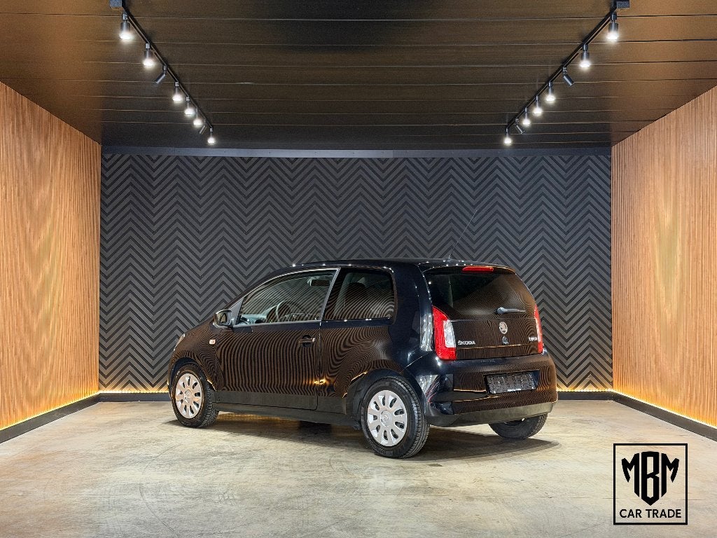 ✅ Skoda Citigo 1.0i 12 Maanden GARANTIE Airco, Auto's, Voorwielaandrijving, Stof, Electronic Stability Program (ESP), Zwart