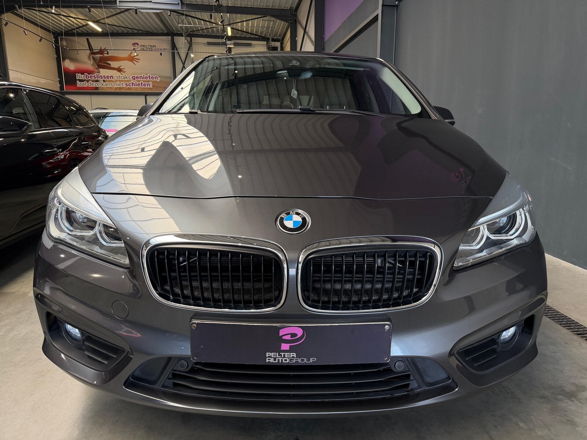 BMW 218 Active Tourer Automaat Navigatie, Auto's, BMW, Parkeersensor, Zwart, Bedrijf, 5 zetels