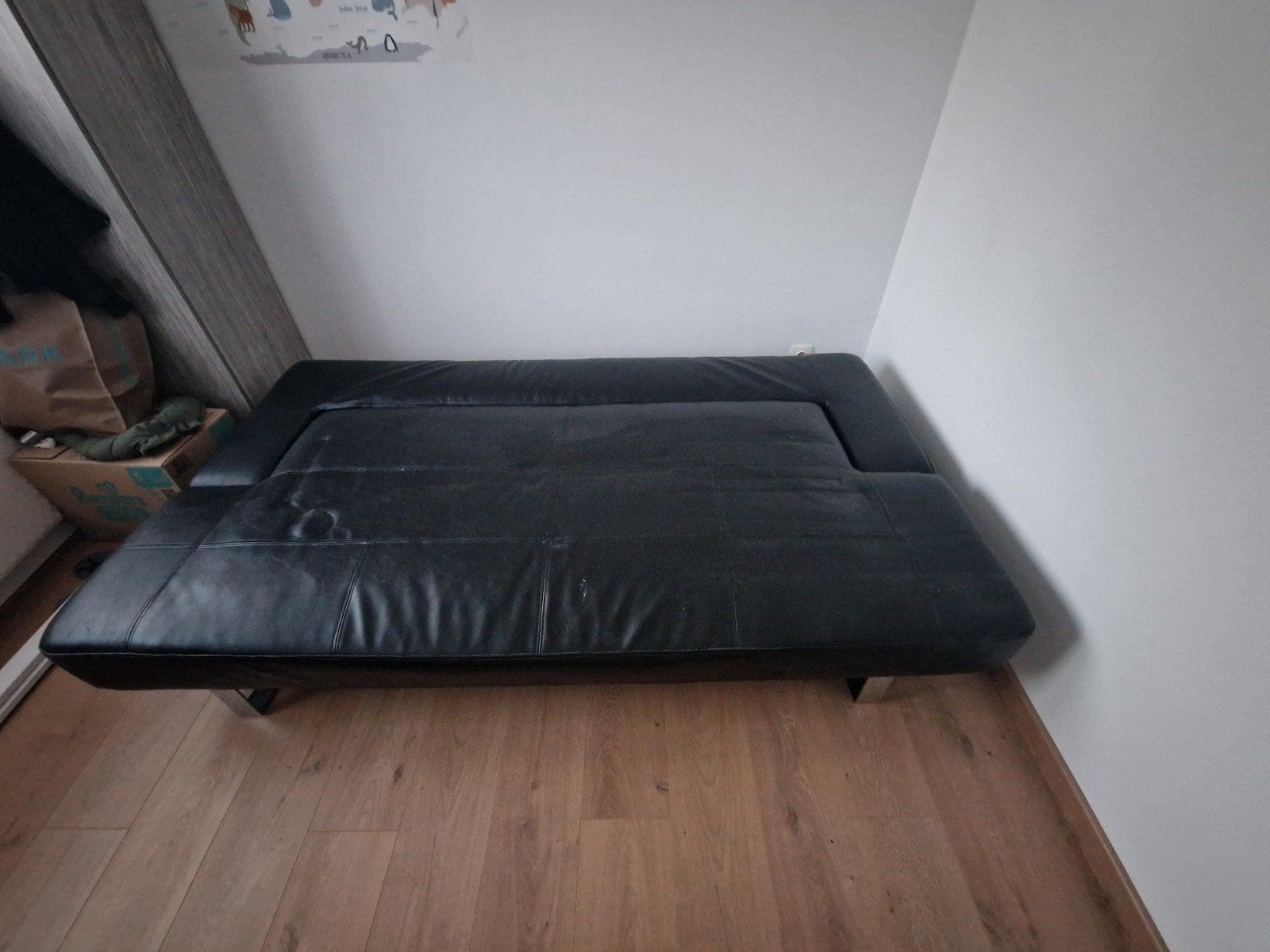 Gratis- Uitschuifbare zetel in kunstleder., Ophalen