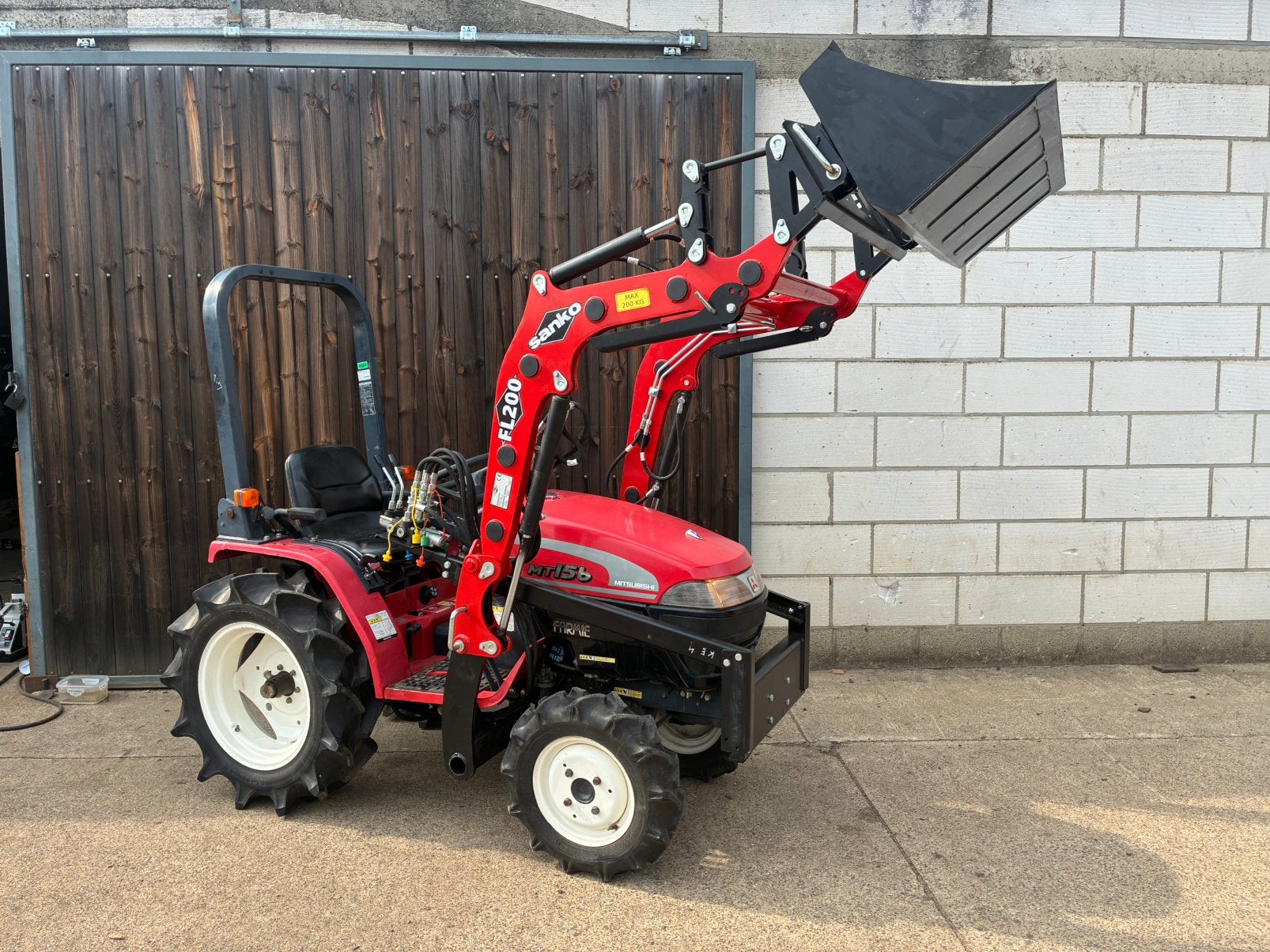 Minitractor Mitsubishi MT156 met voorlader, Ophalen