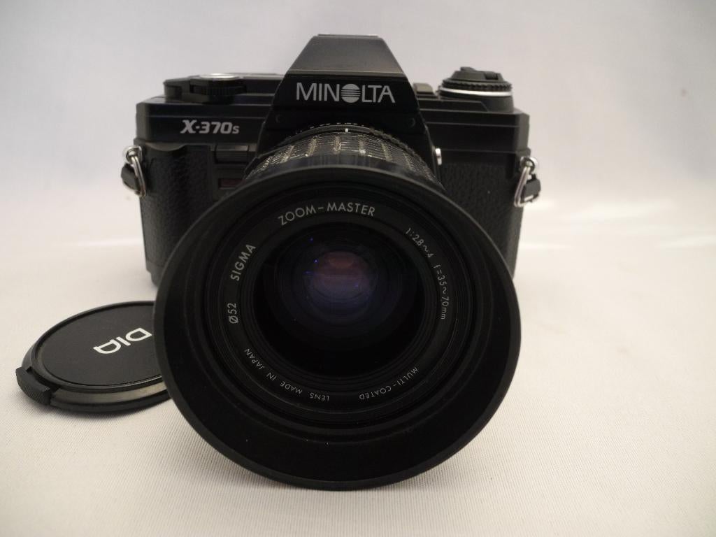 Minolta X370s met Sigma 2.8-4 35-70 lens, Audio, Tv en Foto, Fotocamera's Analoog, Ophalen