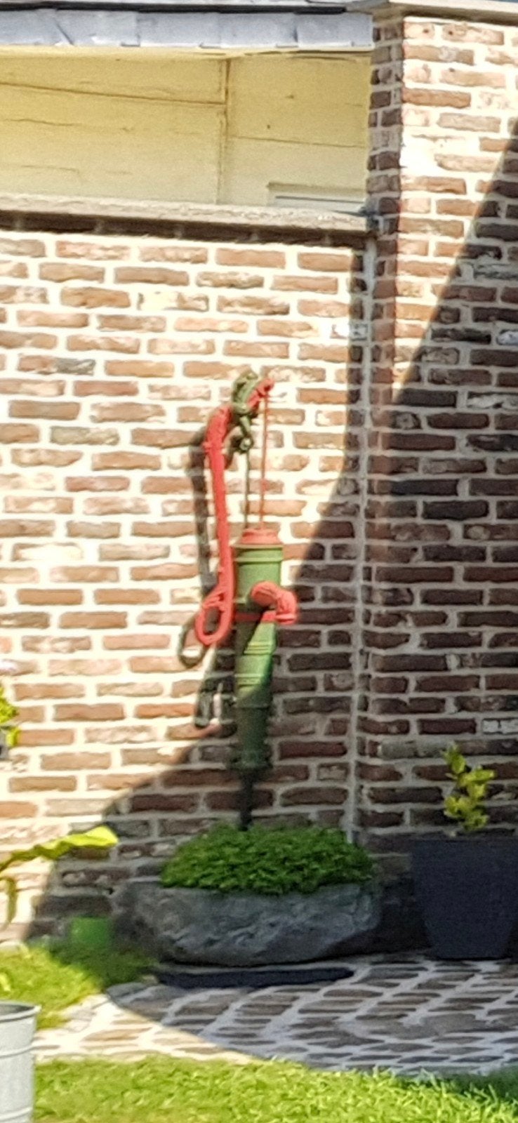 Authentieke ijzere waterpomp, Enlèvement