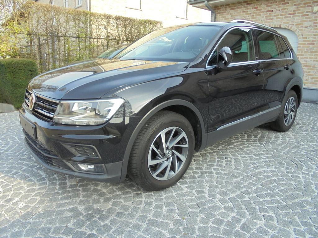 Volkswagen Tiguan 1.4 TSI 125pk SOUND / NAVI/ PDC/ CC/, Auto's, Volkswagen, 0 kg, 4 cilinders, https://public.car-pass.be/vhr/4fb53aa3-ffe2-4eb5-8519-a0baa4d288f3