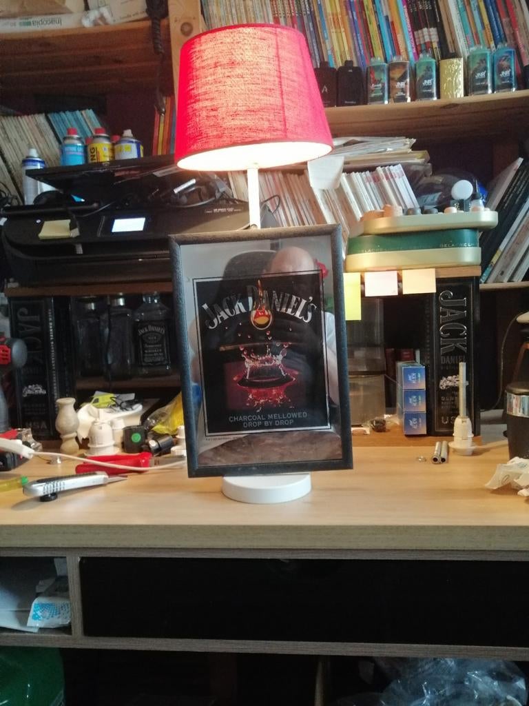 Jack Daniels spiegellamp, Ophalen