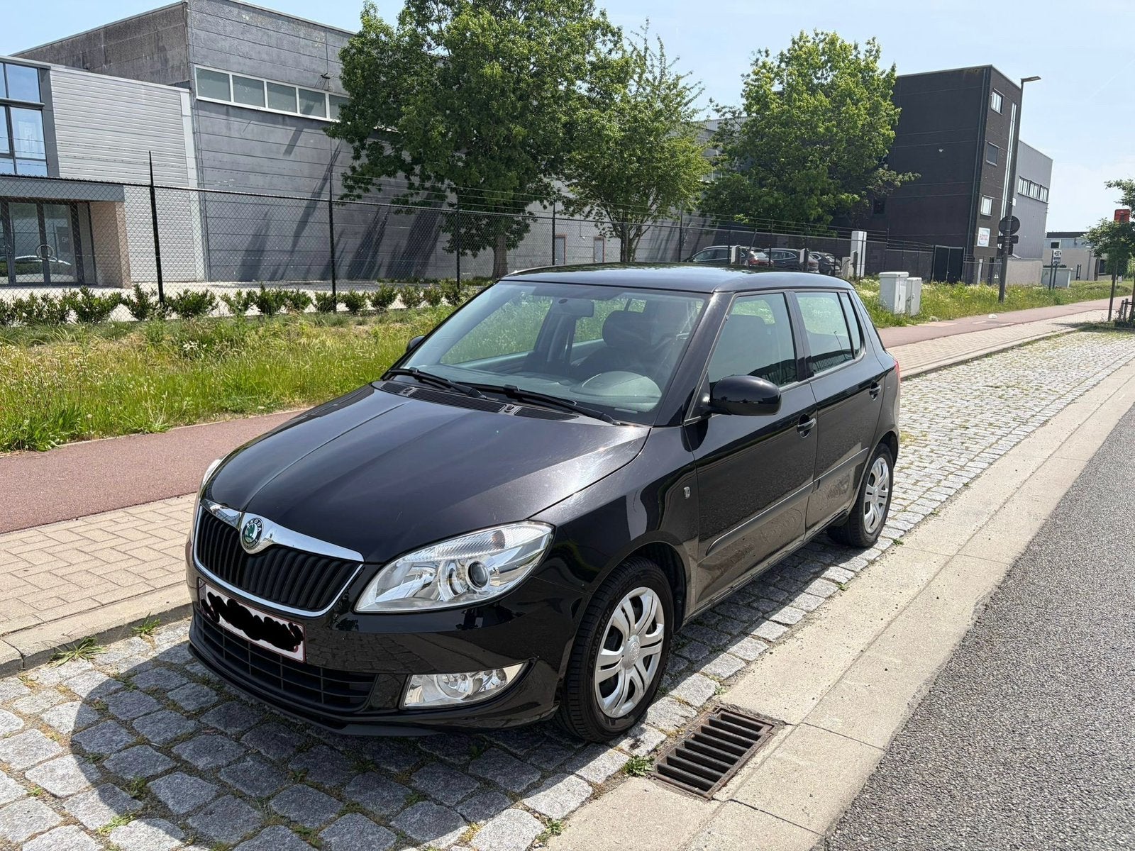 Skoda Fabia 1.2 benzine/66995 km/ 2012/ airco/ gekeurd / LEZ, Auto's, Skoda, Euro 5, Stof, Zwart, Zwart