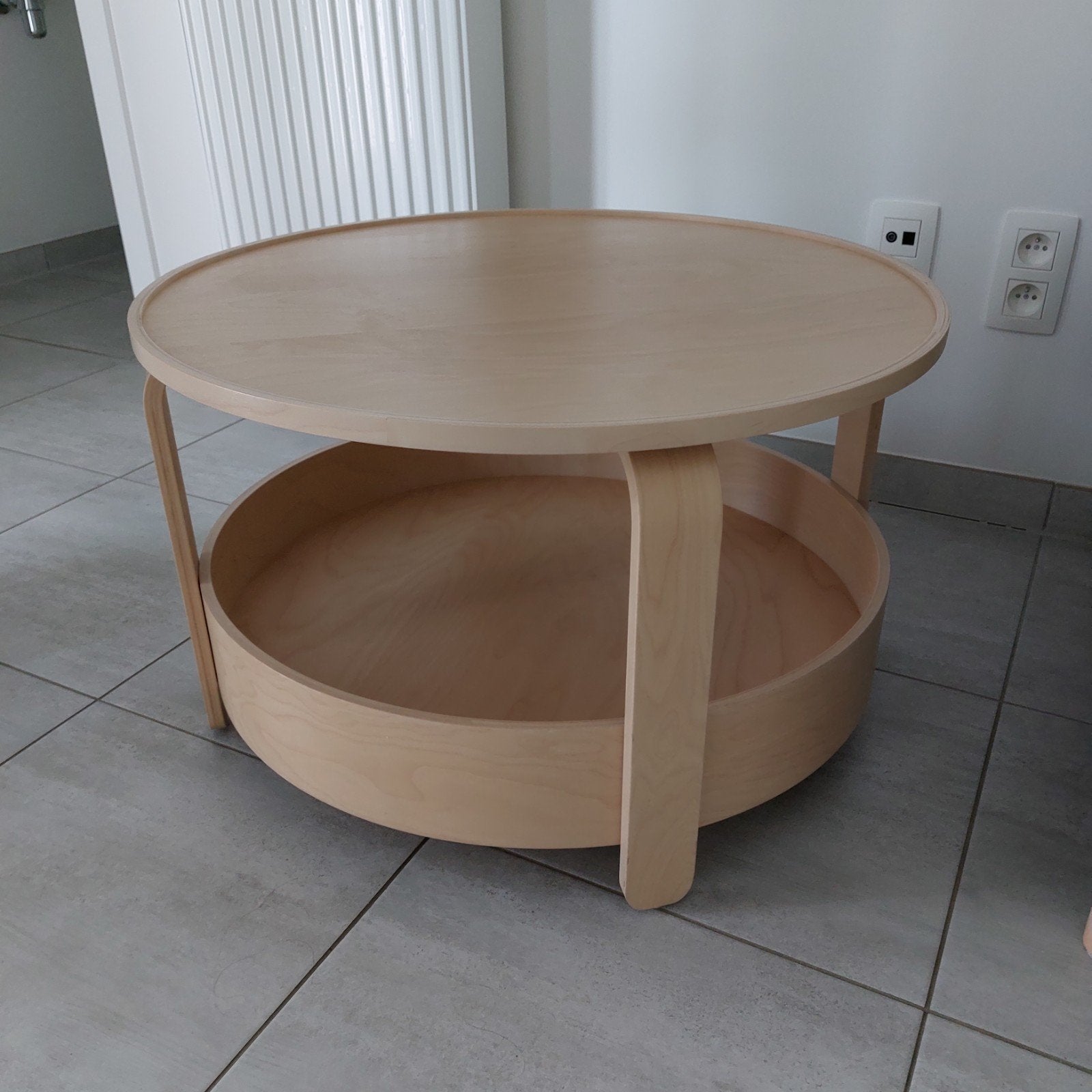 ronde houten salontafel, Ophalen