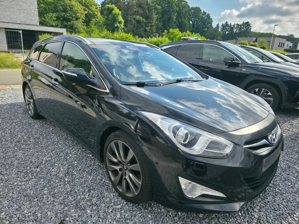 Hyundai I40 SW 1.7 CRDi Executive Full Option, Auto's, Hyundai, Voorwielaandrijving, Euro 5, 4 cilinders, Zwart