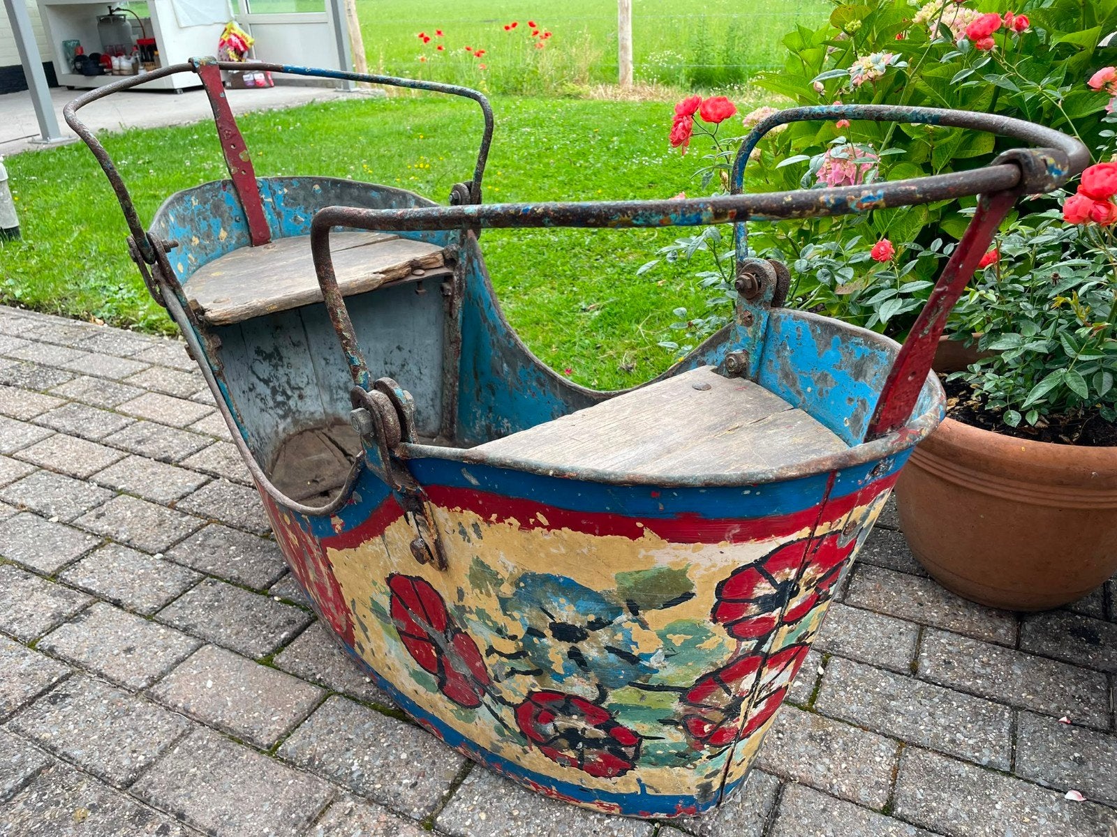 Oude antieke kermisschommel, Ophalen