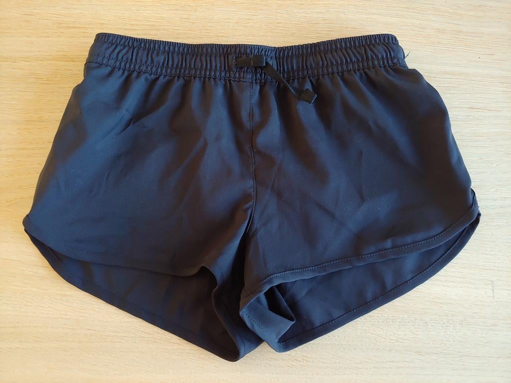 Zwarte surf short maat 8 / 9 jaar als nieuw, Ophalen of Verzenden, Zo goed als nieuw, Olaian, Meisje