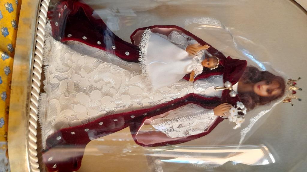 Mariabeeld onder glazen koepel, Ophalen