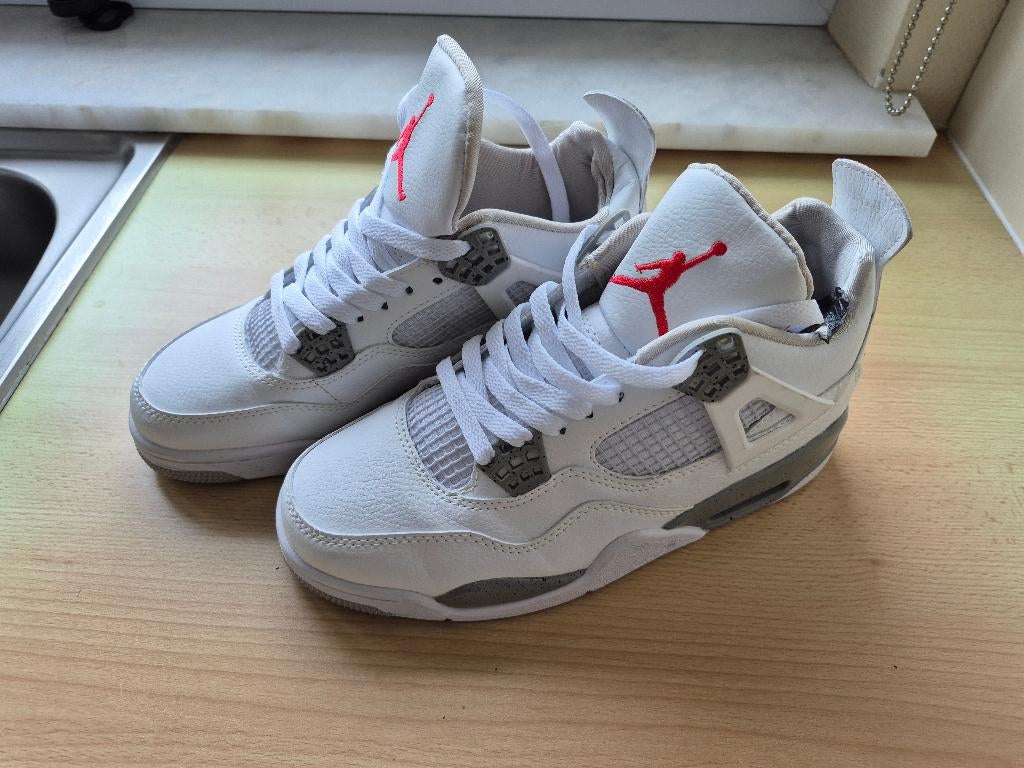 Nieuwe Nike Air Jordan 4 retro white oreo maat 40, Ophalen, Wit, Nike, Nieuw