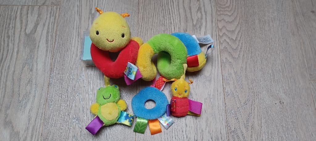 Kleurrijke speelspiraal voor buggy of Maxi Cosi - Taggies, Kinderen en Baby's, Ophalen of Verzenden, Zo goed als nieuw, Rammelaar