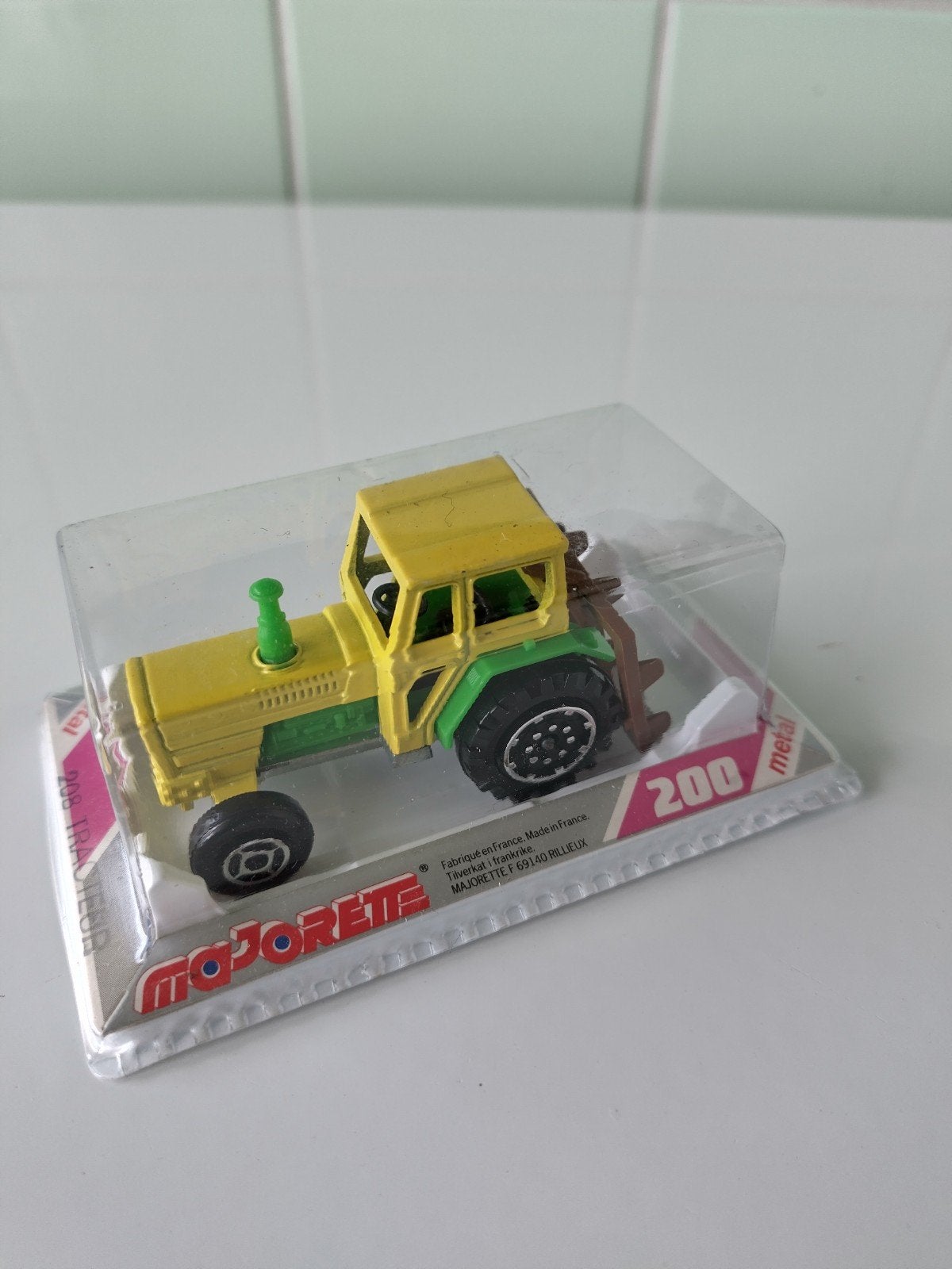 Vintage Majorette Tractor AFHALING LEES BESCHRIJVING, Enlèvement, Neuf, Grue, Tracteur ou Agricole, Majorette