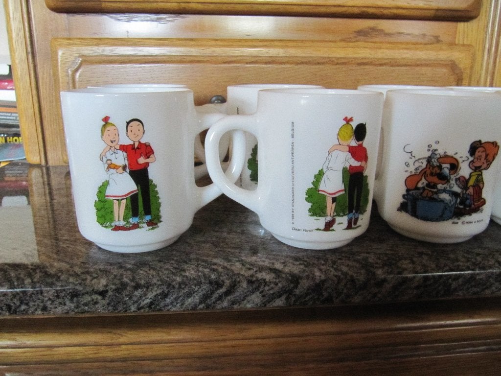 Koffietassen (12) met stripfiguren., Keramiek, Vintage, Nieuw, Mok