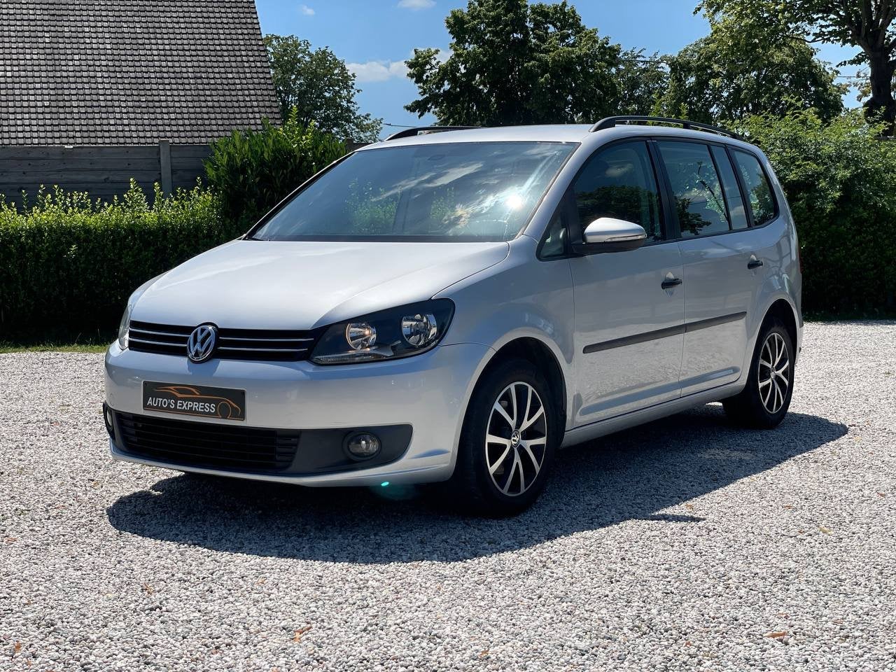 VolkswagenTouran/Automaat/5PL/Cruise/Navi/Camera/Garantie/*, Auto's, Euro 5, 1557 kg, Gebruikt, Bedrijf
