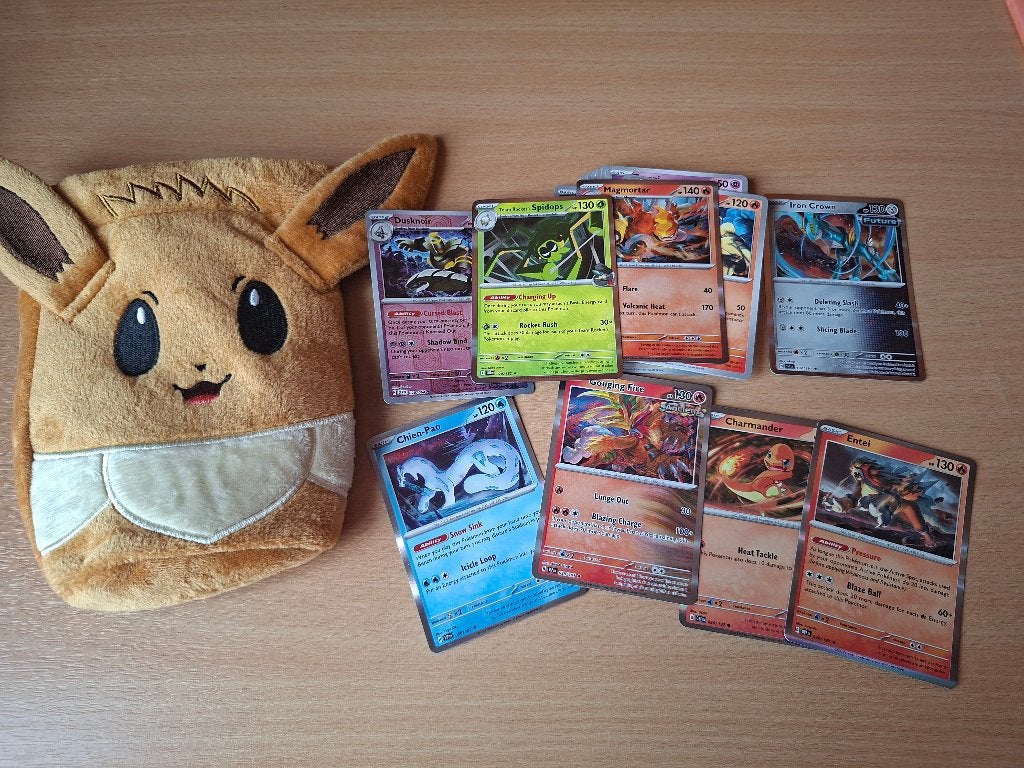 Pokémon kaarten + Eevee pluche zak, Hobby en Vrije tijd, Ophalen of Verzenden, Nieuw, Meerdere kaarten, Foil