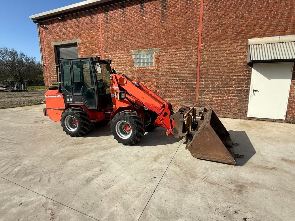 Schäffer 450T kniklader, Ophalen, Wiellader of Shovel