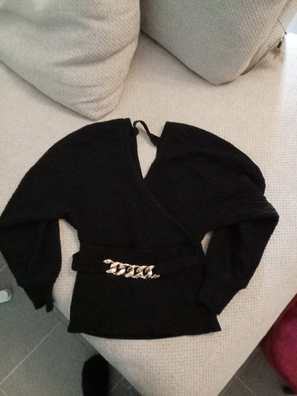 Zwarte trui, Ophalen