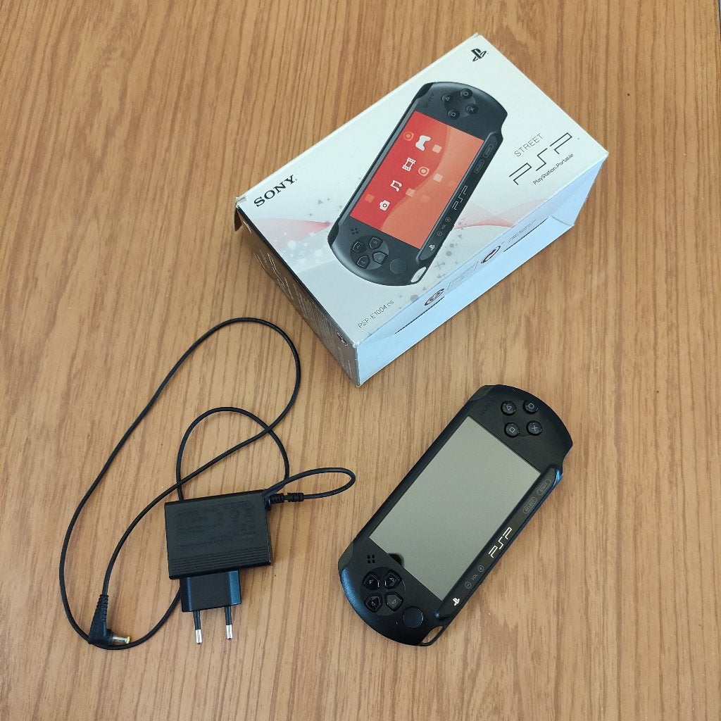 Sony PSP Street E1004 + 9 games, Games en Spelcomputers, Ophalen, Met games, Zwart, Zo goed als nieuw