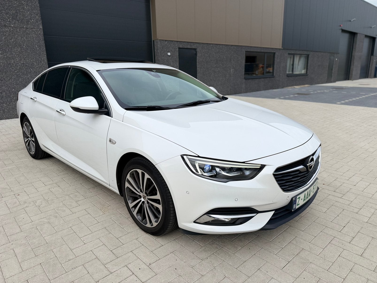 Opel Insignia Grand Sport 2017 1.5 Benzine 165pk Manueel, Auto's, Voorwielaandrijving, 4 cilinders, Wit, Leder