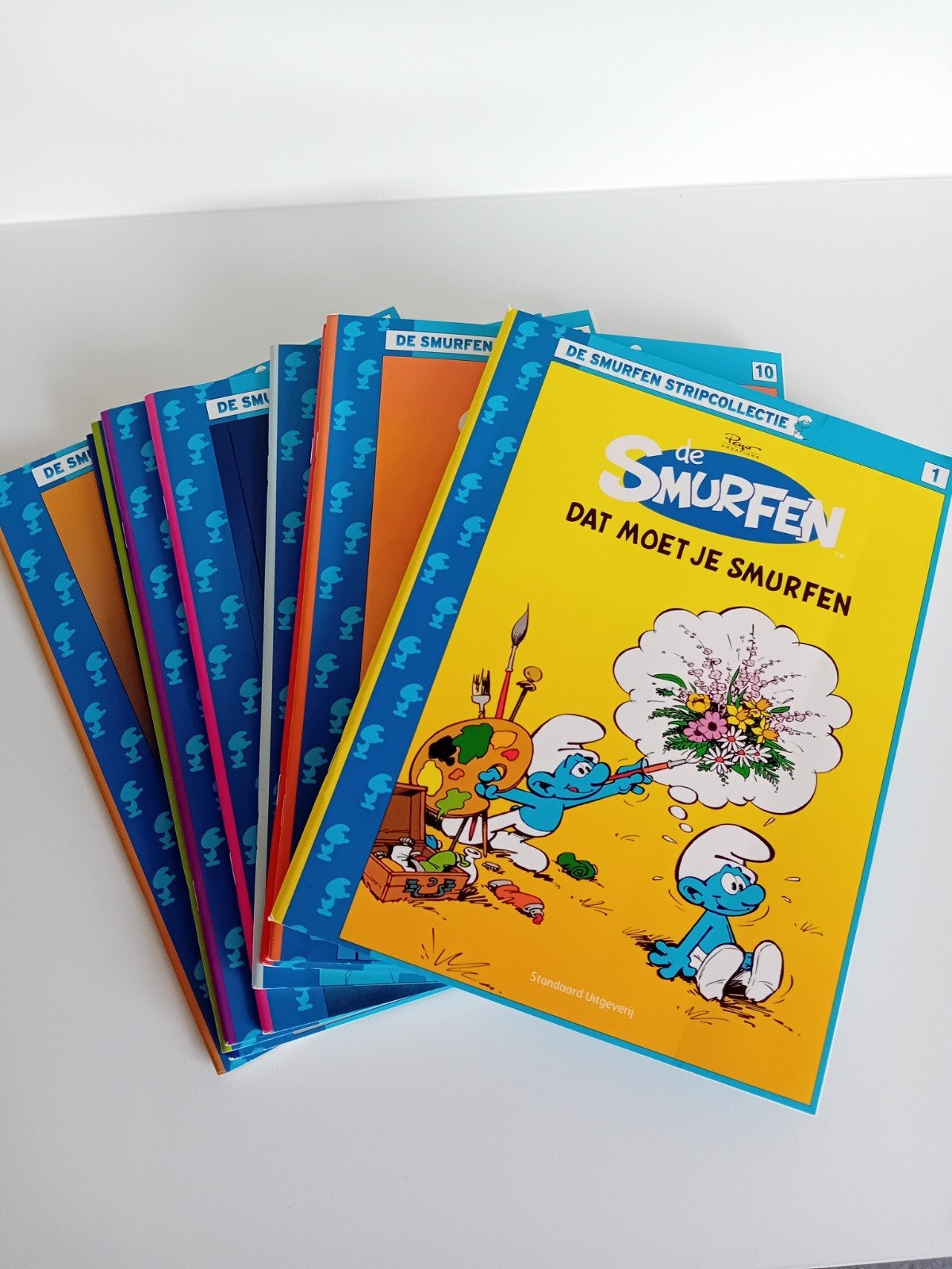 10 strips van de smurfen, Boeken, Ophalen