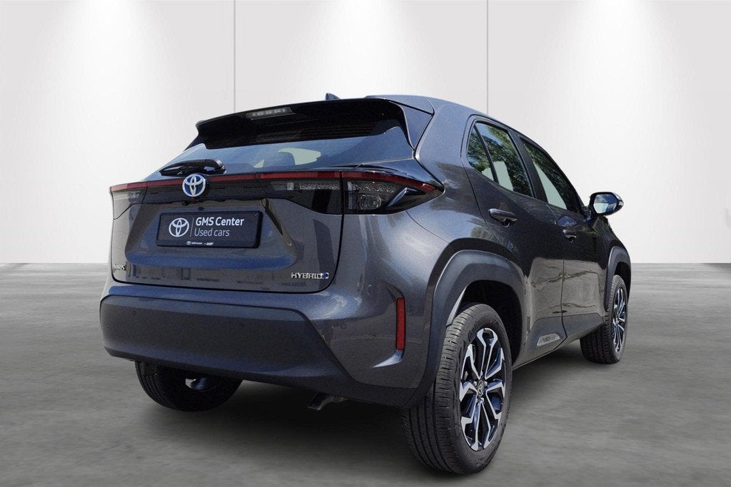 Toyota Yaris Cross 1.5 VVT-ie Hybrid 85kW Dynamic Plus CVT +, Auto's, Stof, Gebruikt, 116 pk, 5 zetels