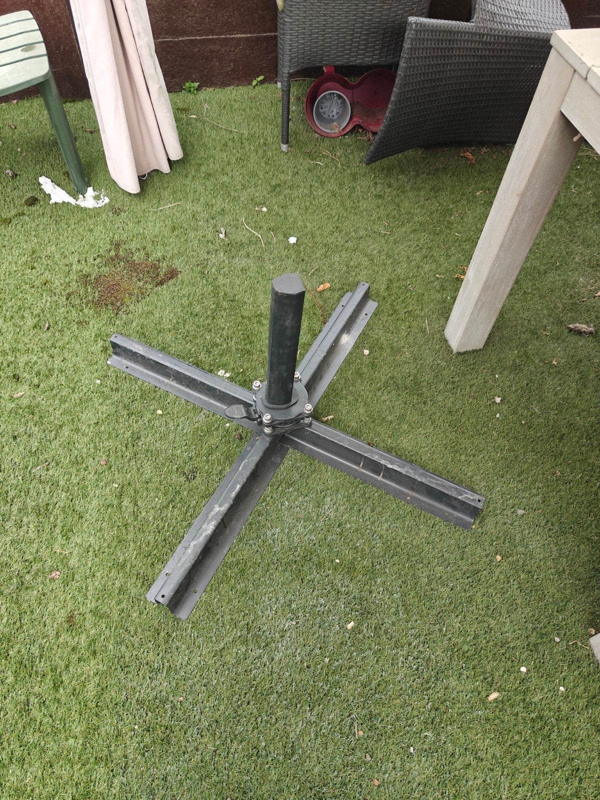 zwevende tuinparasol, Ophalen