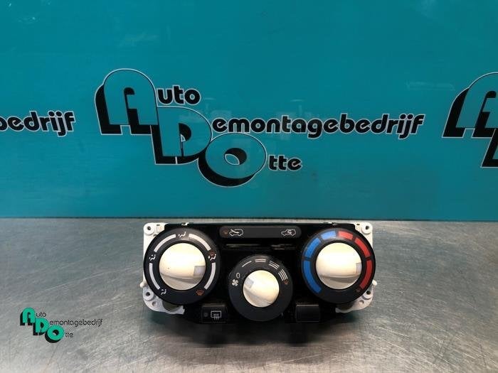 Panneau de commandes chauffage d'un Nissan Micra (Micra 03-), -, 3 mois de garantie, Utilisé, -