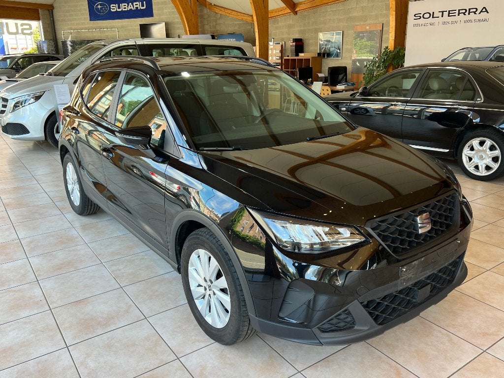 Seat Arona 0.9i 2022 54 000 Km, Voorwielaandrijving, Stof, Zwart, 600 kg