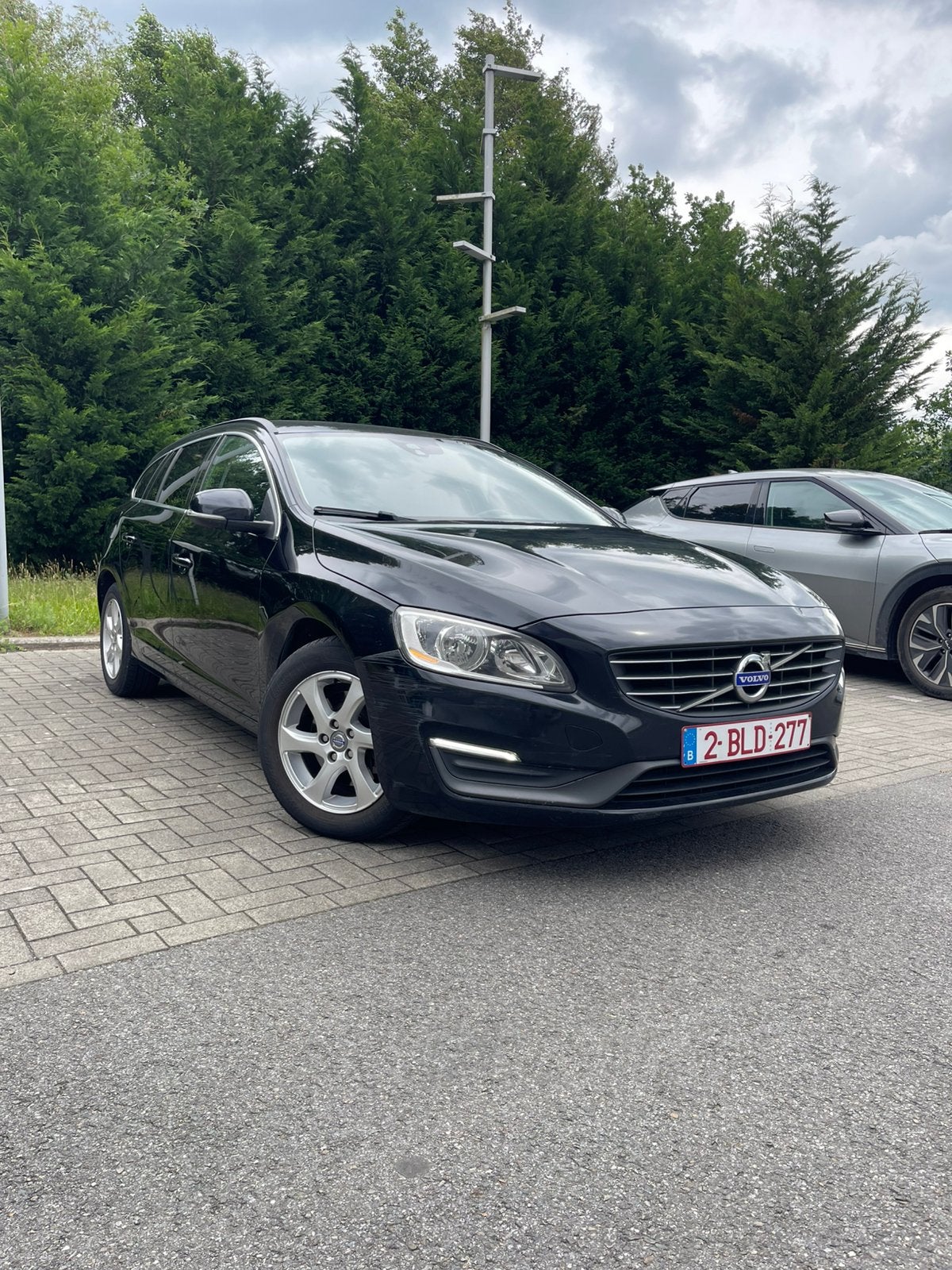 Volvo V60 D2 1.6 automaat leder/pdc/trekhaak, Auto's, Volvo, Automaat, Euro 5, Zwart, Leder