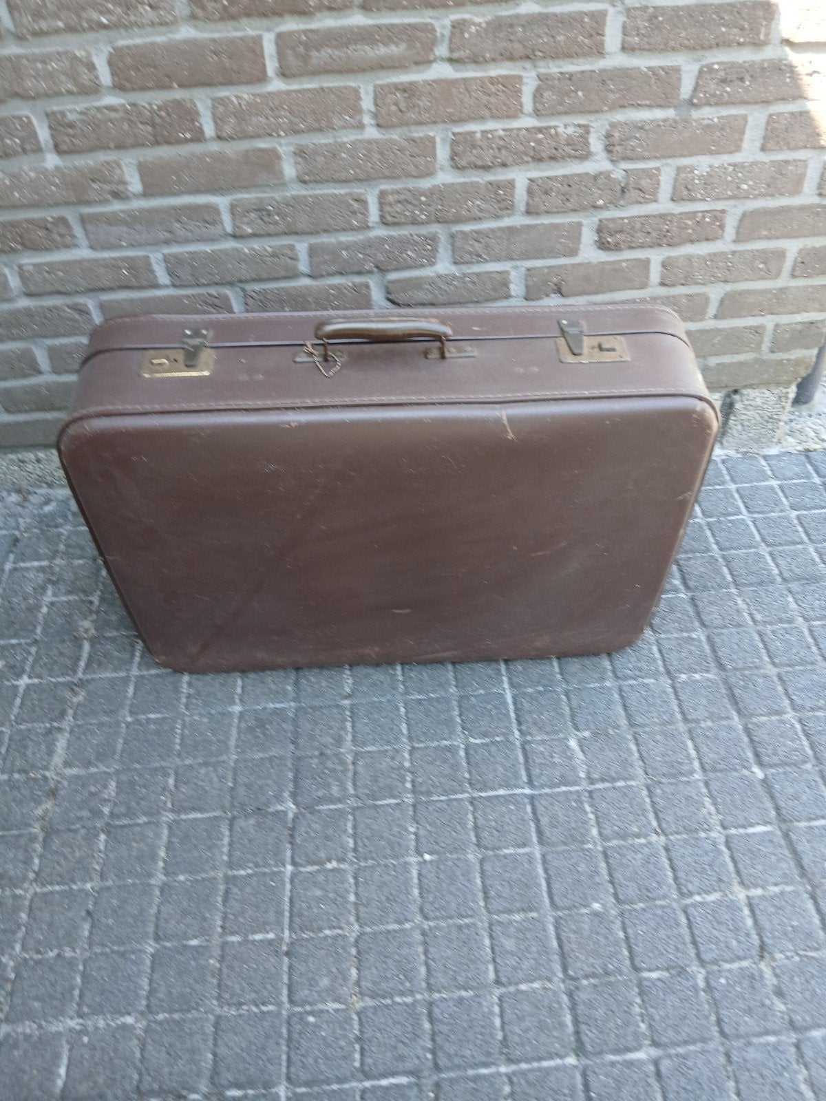oude koffern, Ophalen