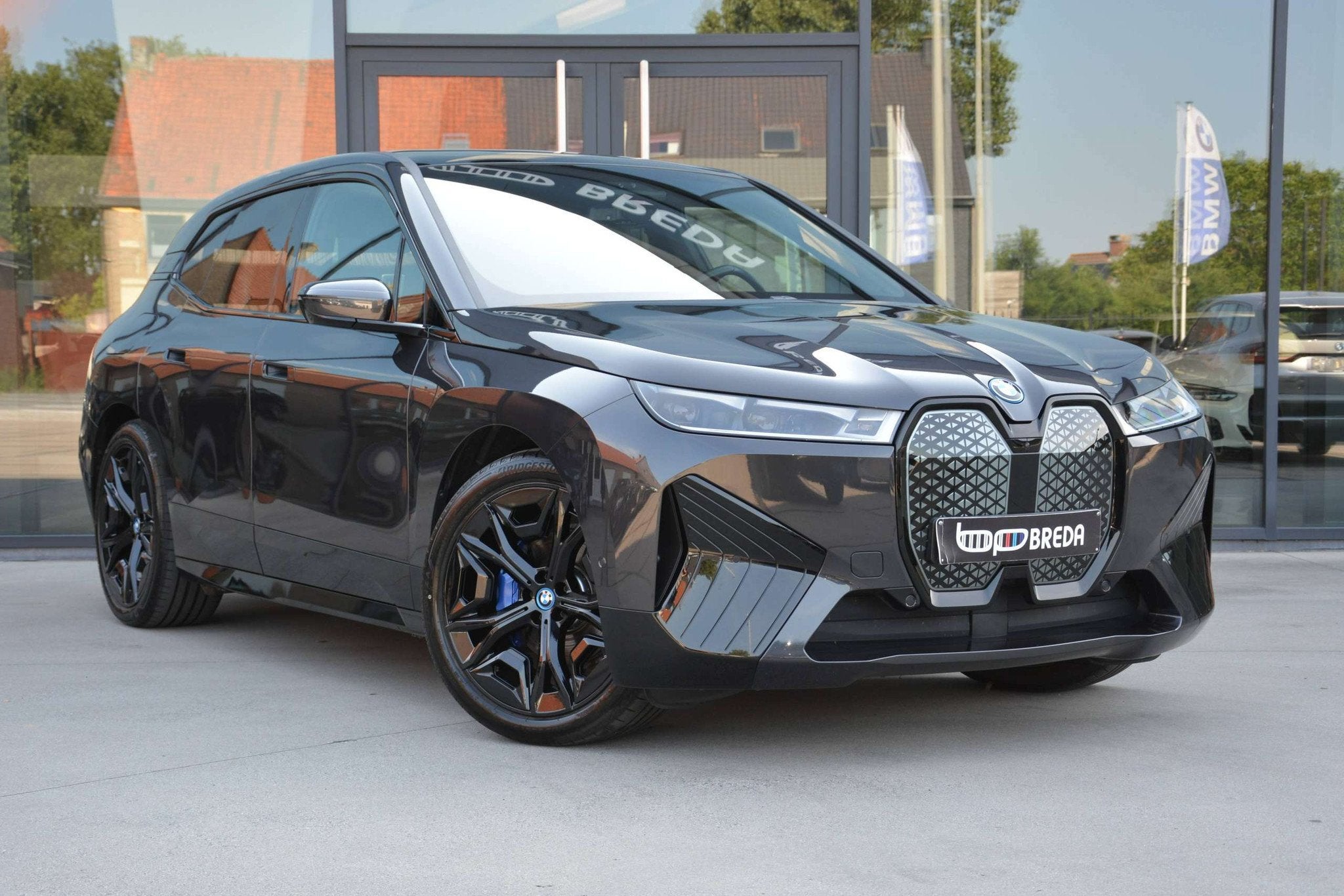 BMW iX xDrive50 M-Sport/Skylounge/Softclose/Massage/ACC, Auto's, BMW, Automaat, Gebruikt, Zwart, Leder