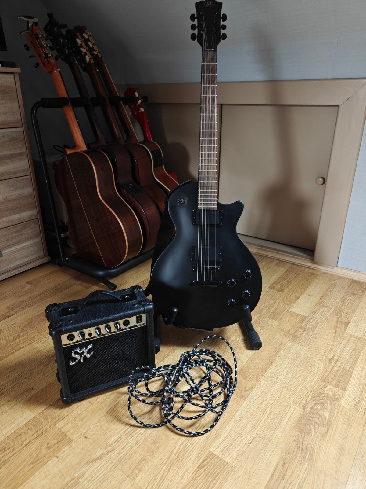 Elektrische guitar merk SX met Amp 10 wat, Enlèvement