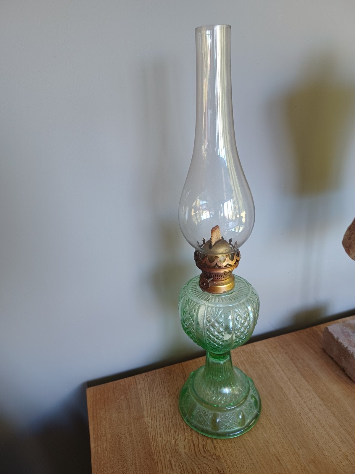 olielamp met groen glas, Ophalen