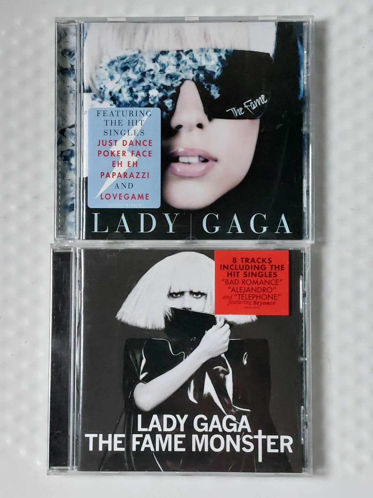 LADY GAGA, Envoi, Comme neuf