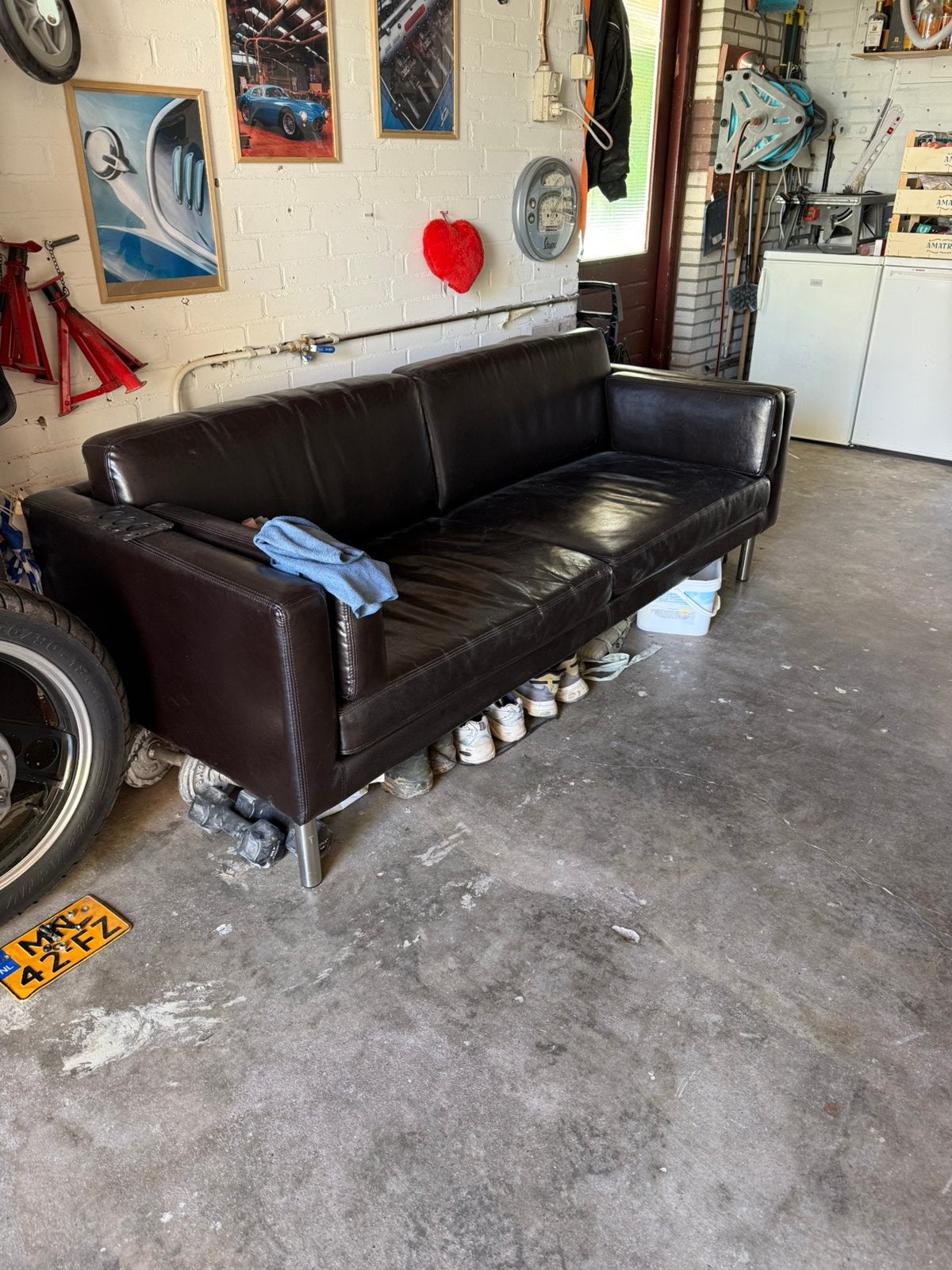 Mooie zwart lederen zetel, Ophalen, 100 tot 125 cm, Leer, Zo goed als nieuw