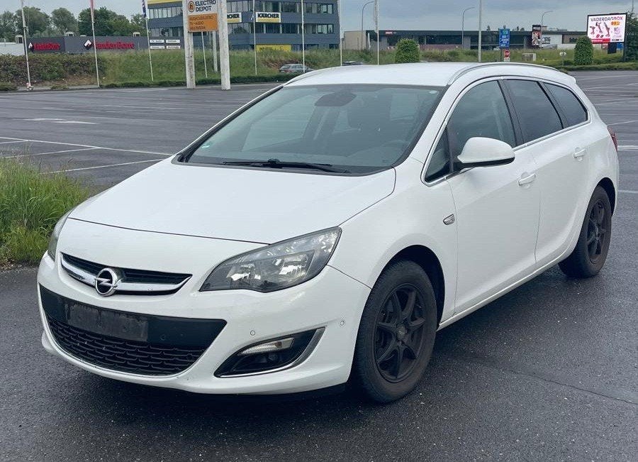 Opel Astra 1.4benzine Manual/Navi Euro6 2015 TURBO, Auto's, Opel, Voorwielaandrijving, Stof, Euro 6, Wit