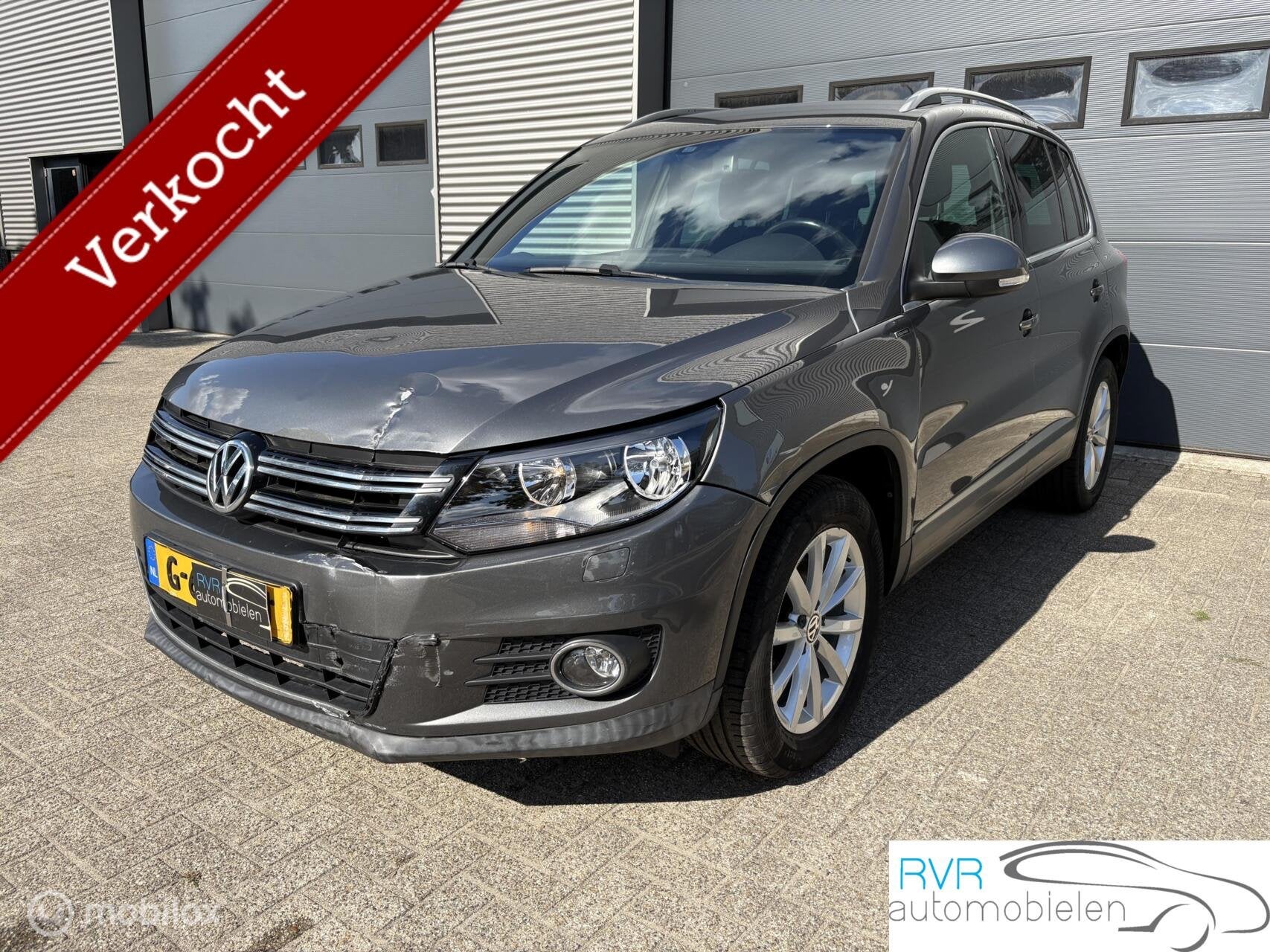 Volkswagen Tiguan 1.4 TSI Sport&Style AUTOMAAT/CRUISE/NAVI, Stof, Gebruikt, 4 cilinders, 1451 kg