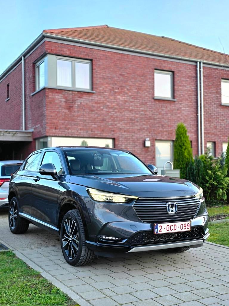 Honda HR-V 1.5 Hybrid 2024 (Advance) Pristine Condition, Auto's, Leder en Stof, 96 kW, Dealer onderhouden, Zilver of Grijs