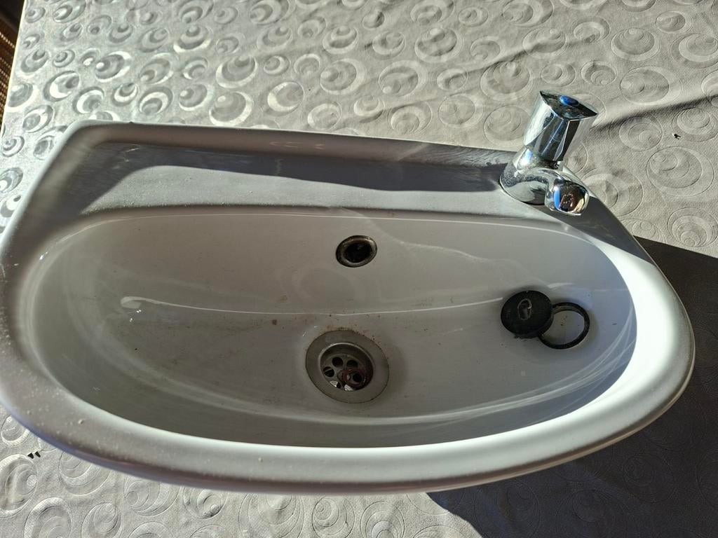 Wasbakje wc, Ophalen