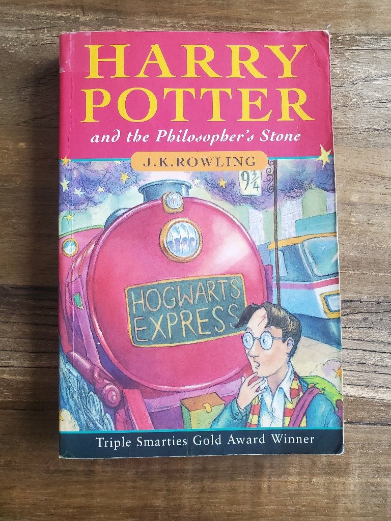 Livre harry Potter and the philosophers Stone 2000 faire off, Enlèvement ou Envoi, Utilisé