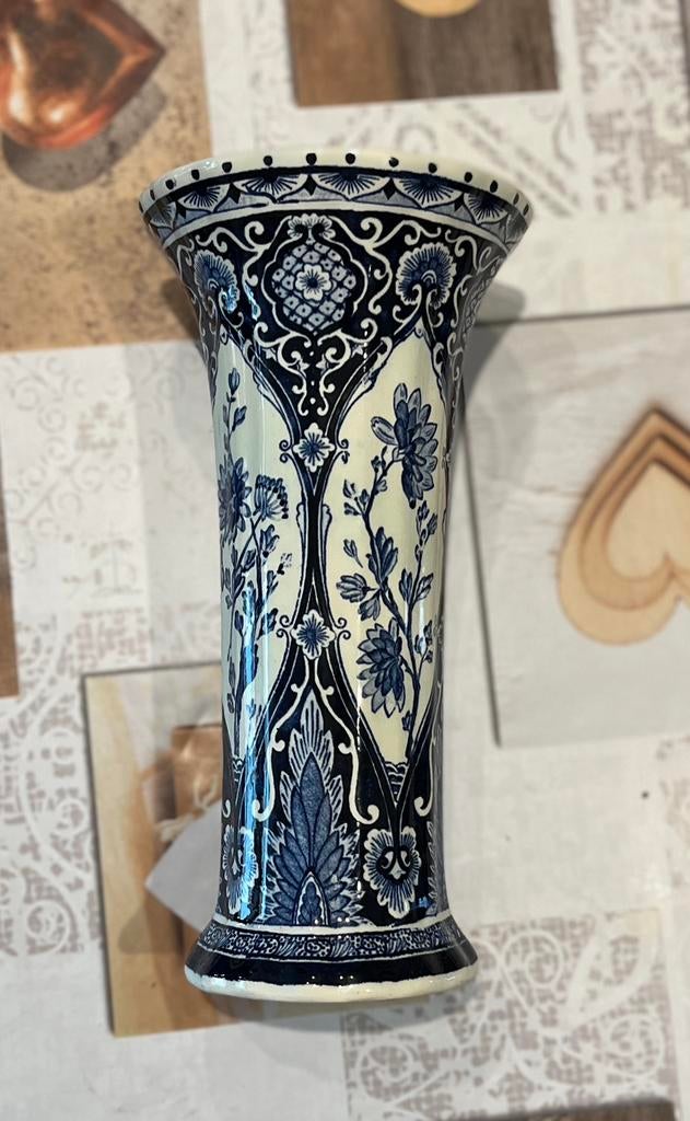 Delfts blauwe vaas, Ophalen